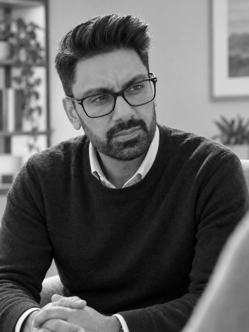 Imran listening attentively during a conversation
